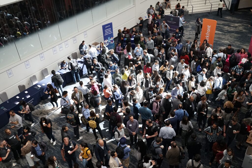 The picture showcases a group of people assembled at a networking event, which is an event marketing example